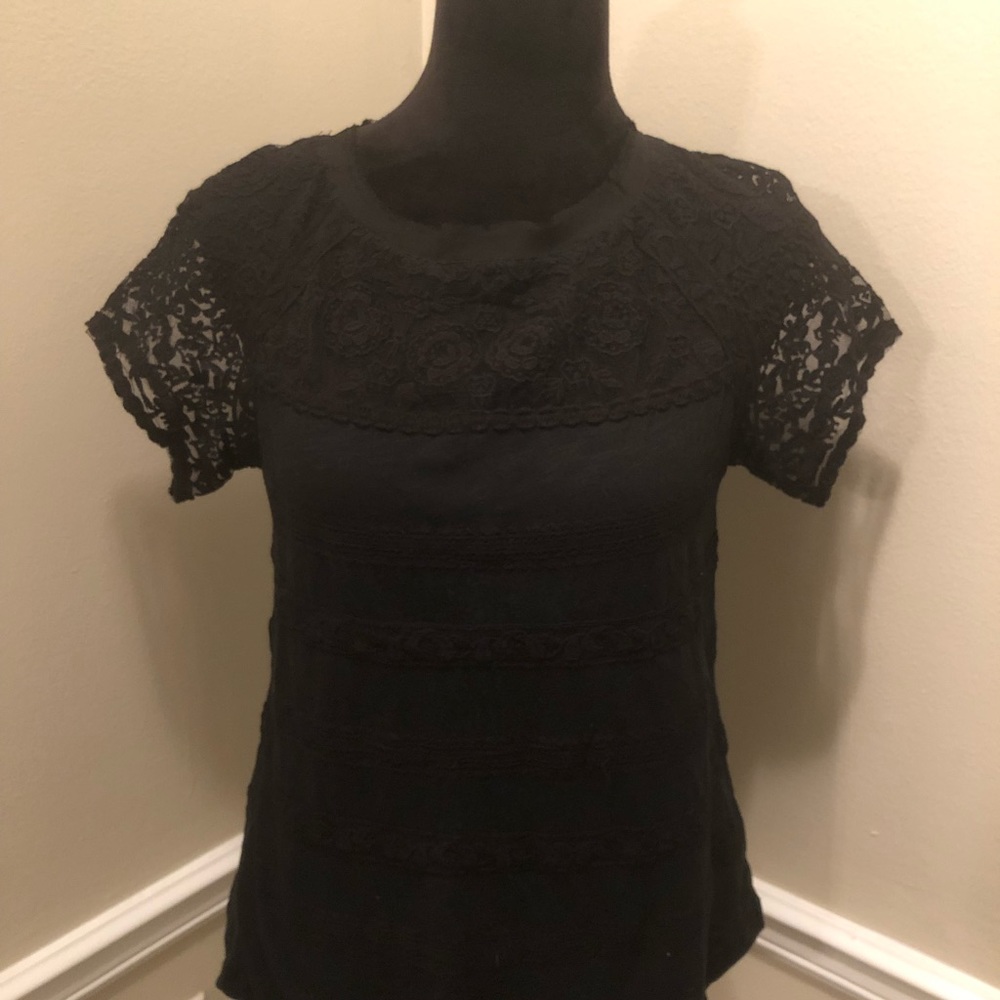 Black, short sleeved shirt. Lace sleeves